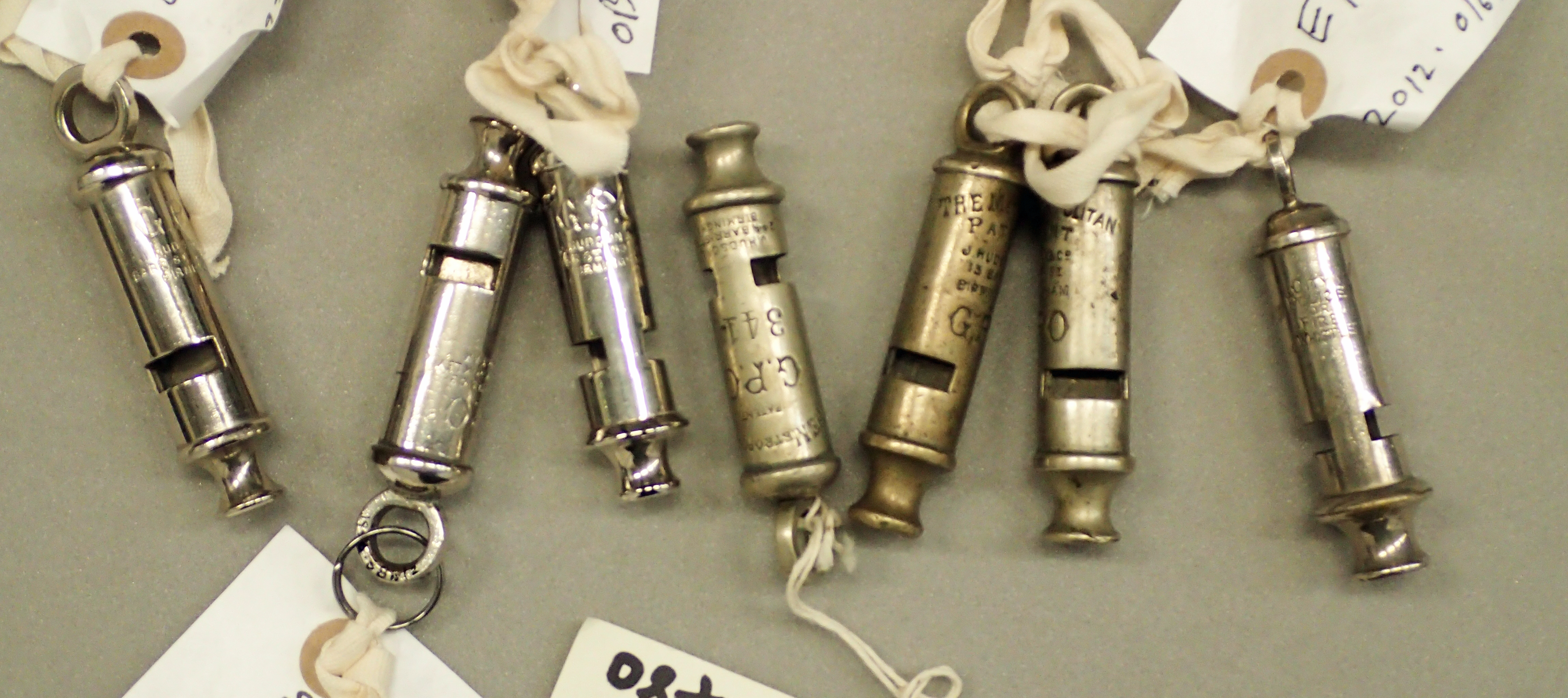 Part of the collection of Postmen’s whistles in The Postal Museum collection