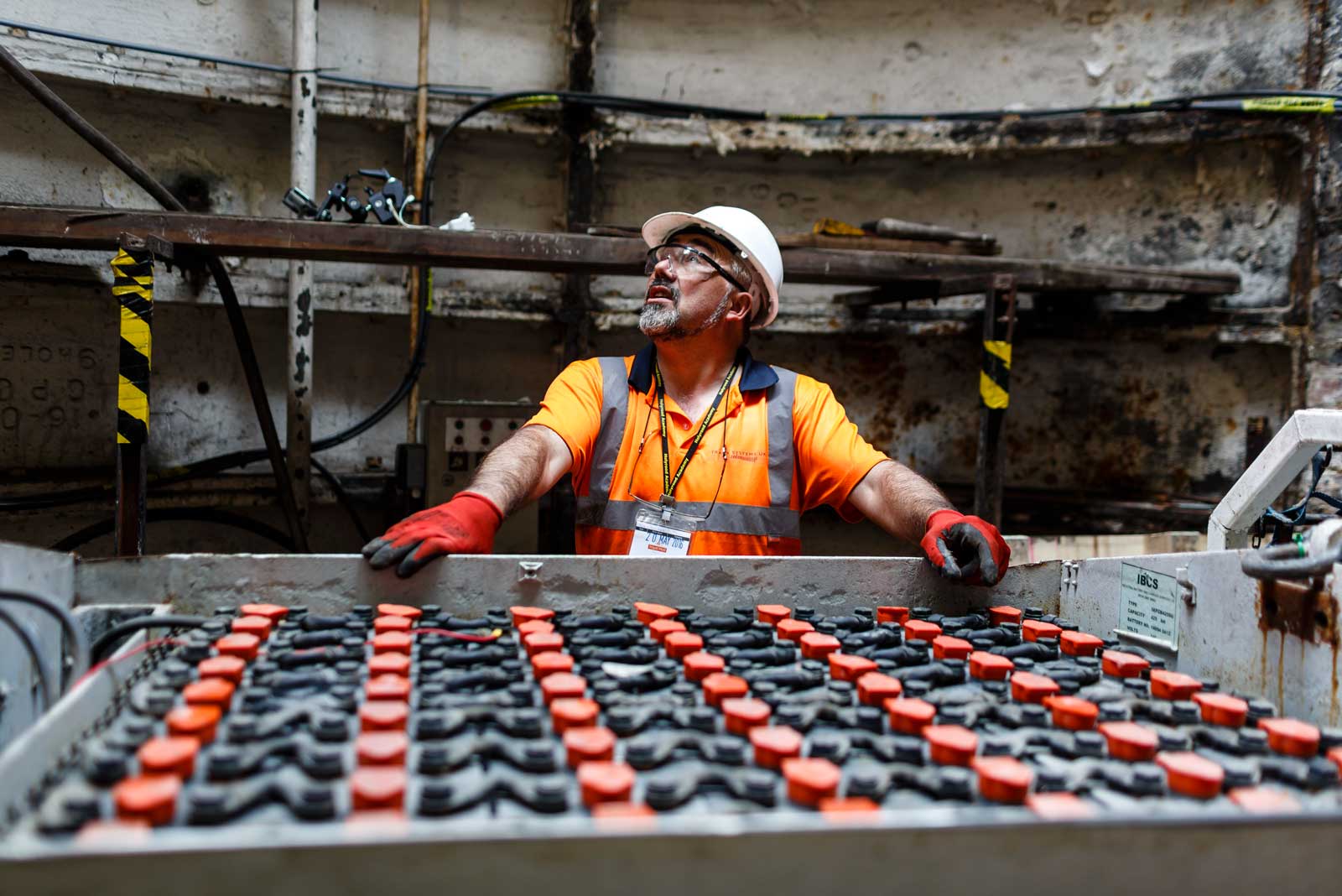 Part of the crew readies the old loco battery for hoisting out of Mail Rail