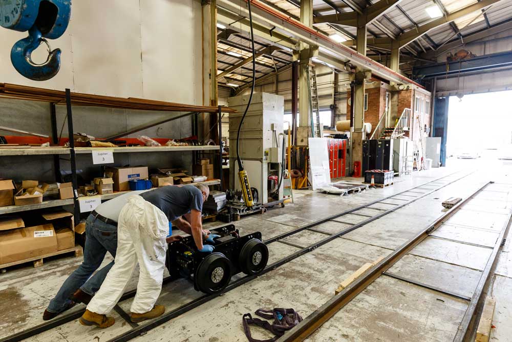 Severn lamb push the bogie along specially made tracks to make sure it runs smoothly