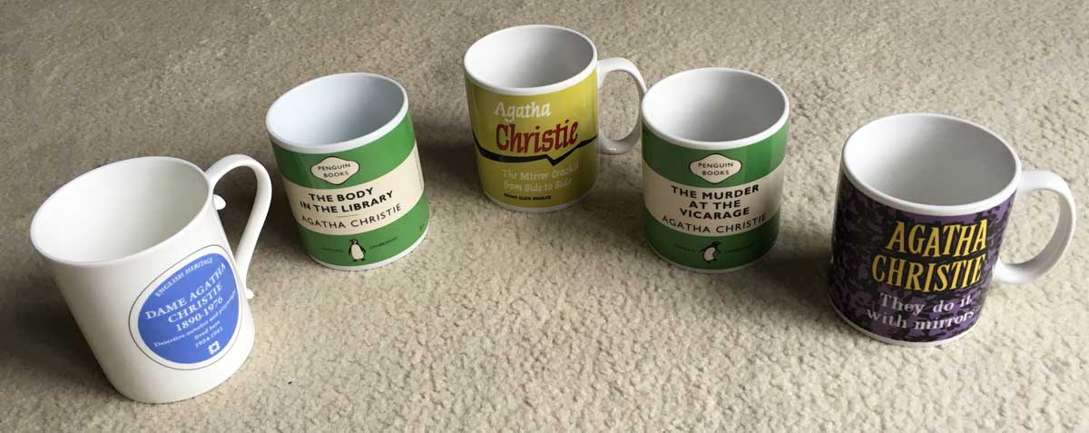 Five mugs based on Agatha Christie book covers