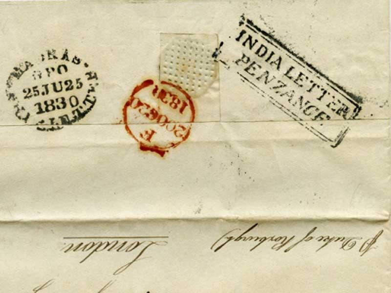 A closeup of an envelope stamped with the text 'India Letter Penzance'.