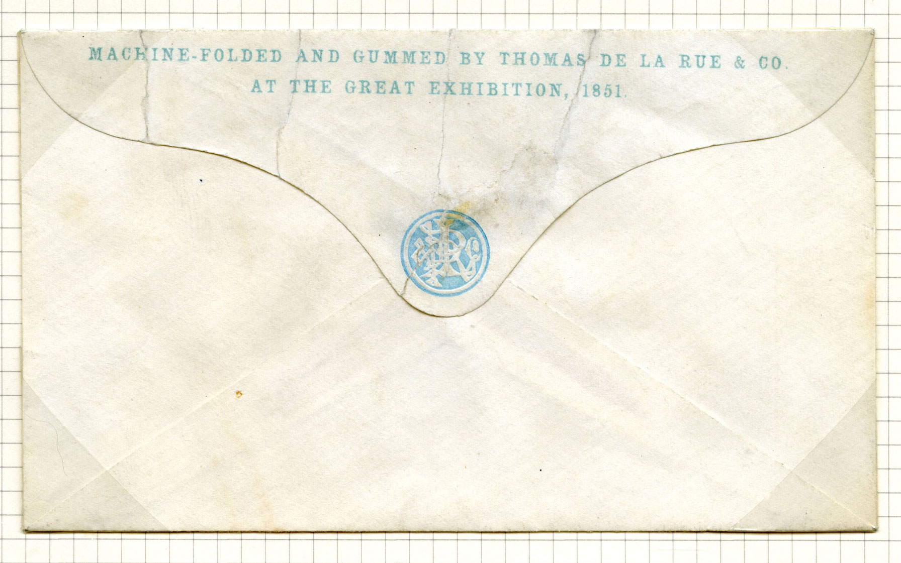 Folded envelope inscribed along the top 'Machine folded and gummed by Thomas De La Rue & Co. at The Great Exhibition, 1851'.