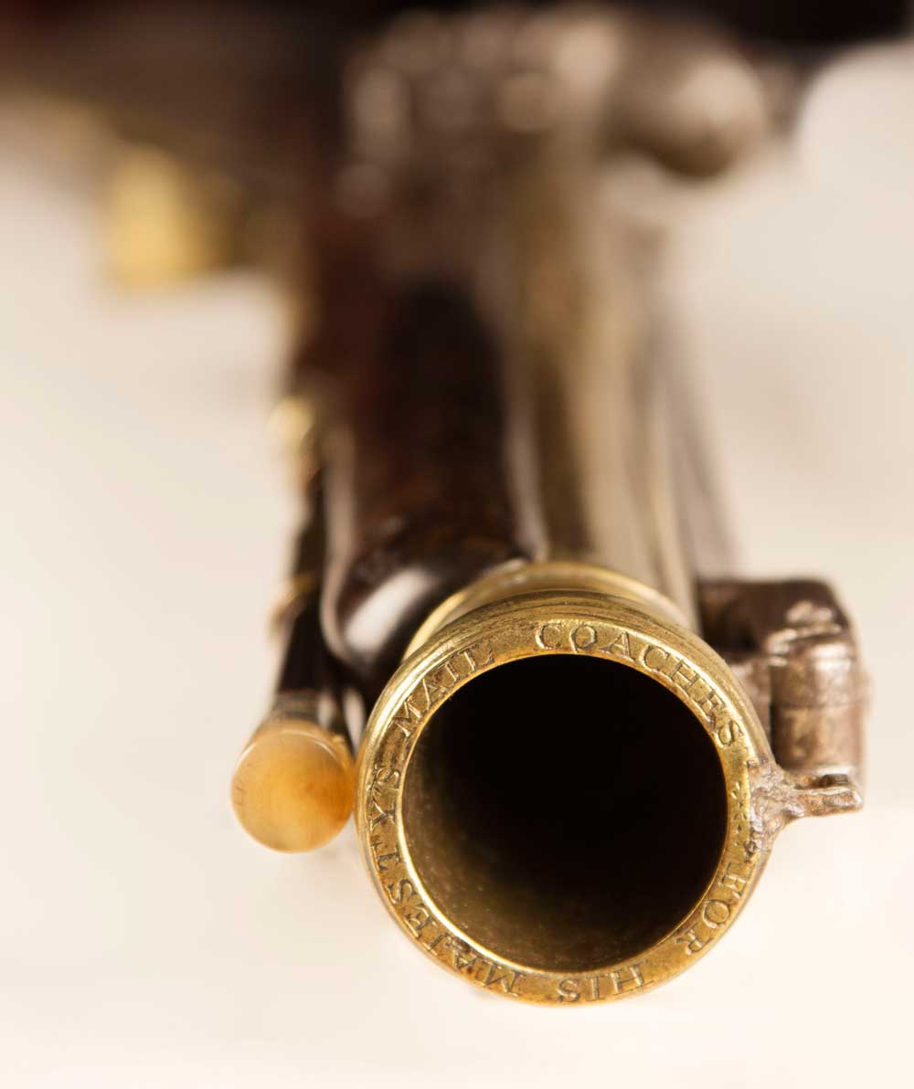 View of barrel of blunderbuss with bayonet, c.1790. 'FOR HER MAJESTY'S MAIL COACHES' is inscribed around the circumference. (OB1996.374)