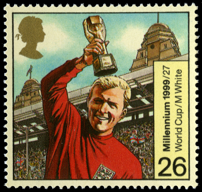 Stamp depicting an illustration of Bobby Moore holding the World Cup.