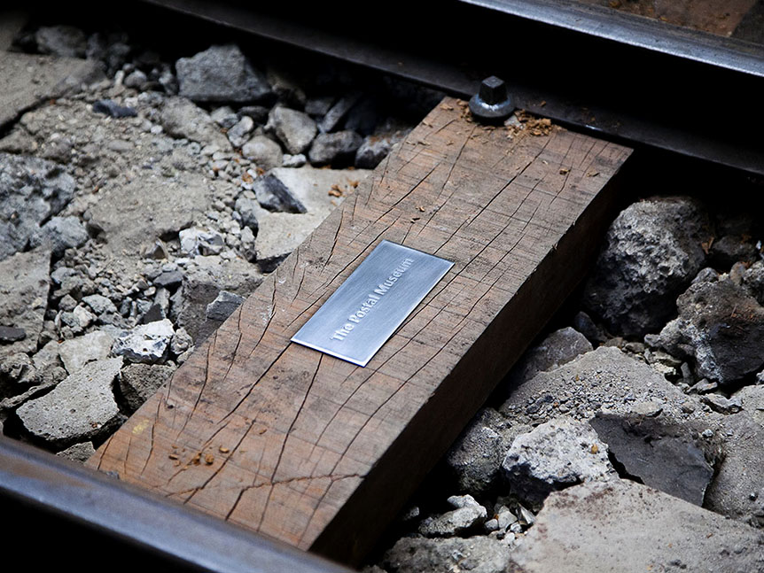 A Mail Rail sleeper with an engraved plaque