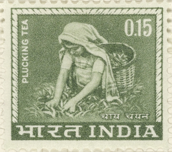 Stamp depicting a female tea picker plucking tea leaves.