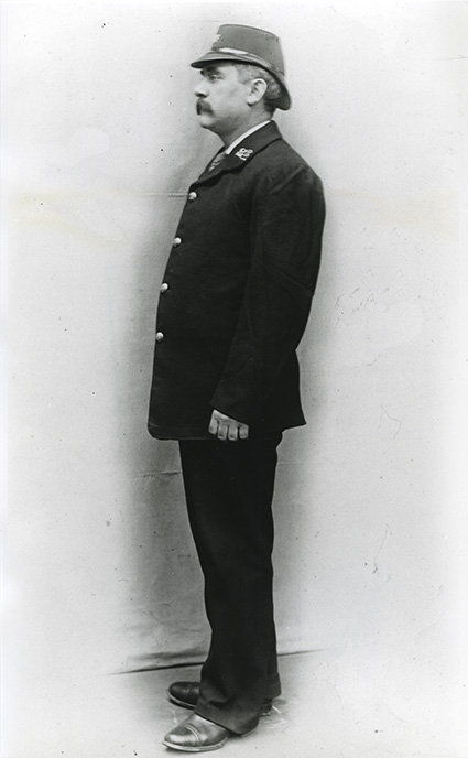 Summer uniform with double peaked shako. London postman of 1904 (POST 118/2060)