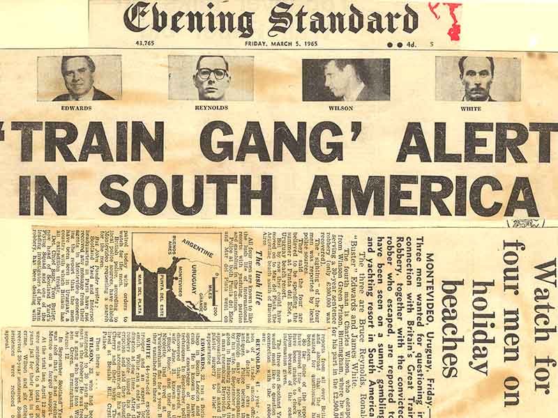A newspaper front page with the headline: Train gang alert in South America, from the Evening Standard newspaper in 1965.