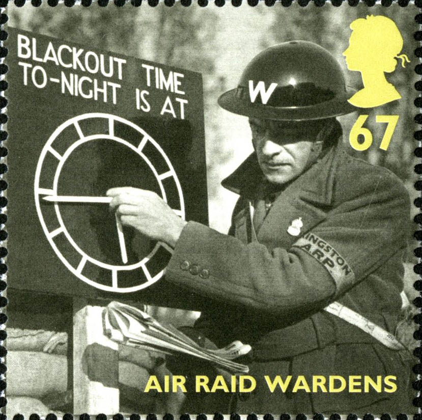 Stamp depicting an Air Raid Warden setting a time on a board.