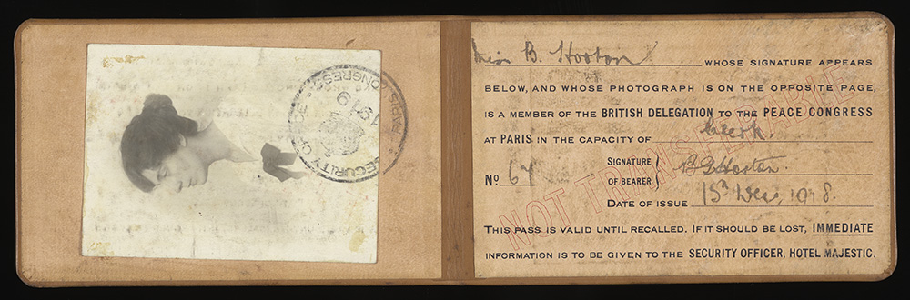 Diary and papers relating to Blanche Horton's employment in Paris. Blanche Horton was in Paris for the signing of The Treaty of Versailles. The diary was created and associated material accumulated when Miss Horton accompanied the British delegation to the 1919 Peace Congress in Paris. E15488/02: Brown leather bound Peace Congress pass. Inscribed in gold on the front of the pass is 'PEACE CONGRESS/ OFFICIAL PASS/ Paris 1919/ BRITISH DELEGATION'. In the centre of the pass between 'OFFICIAL' and 'PASS' is a Tudor crown. Inside the pass on the left is a photograph of Blanche Horton in profile, she is wearing a white top with a black bow. Over the photograph is a black stamp, 'SECURITY OFFICE/ 1919/ PARIS CONGRESS'. Printed inside the pass on right is ' Miss B. Horton WHOSE SIGNATURE APPEARS/ BELOW, AND WHOSE PHOTOGRAPH IS ON THE OPPOSITE PAGE,/ IS A MEMBER OF THE BRITISH DELEGATION TO THE PEACE CONGRESS/ AT PARIS IN THE CAPACITY OF Clerk'. Printed below is 'No.67', the signature of the bearer: 'B G Horton', and the date of issue: '15th Dec 1918.' Printed at the bottom of the pass is 'THIS PASS IS VALID UNTIL RECALLED. IF IT SHOULD BE LOST, IMMEDIATE/ INFORMATION IS TO BE GIVEN TO THE SECURITY OFFICER, HOTEL MAJESTIC.' 