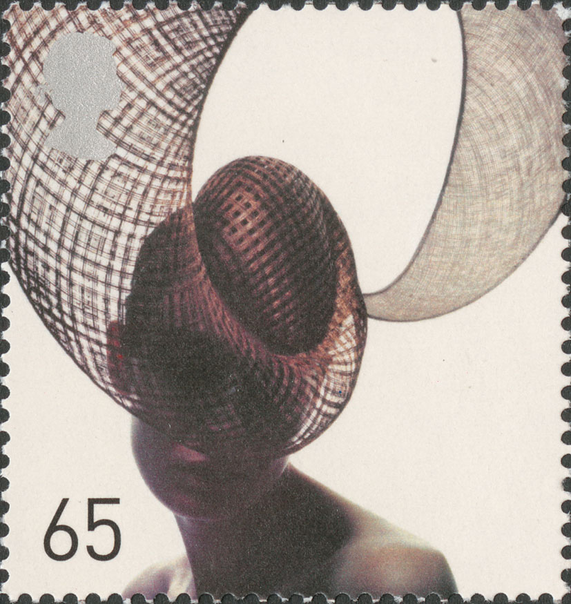 A stamp depicting a sweeping mesh hat by Philip Treacy.