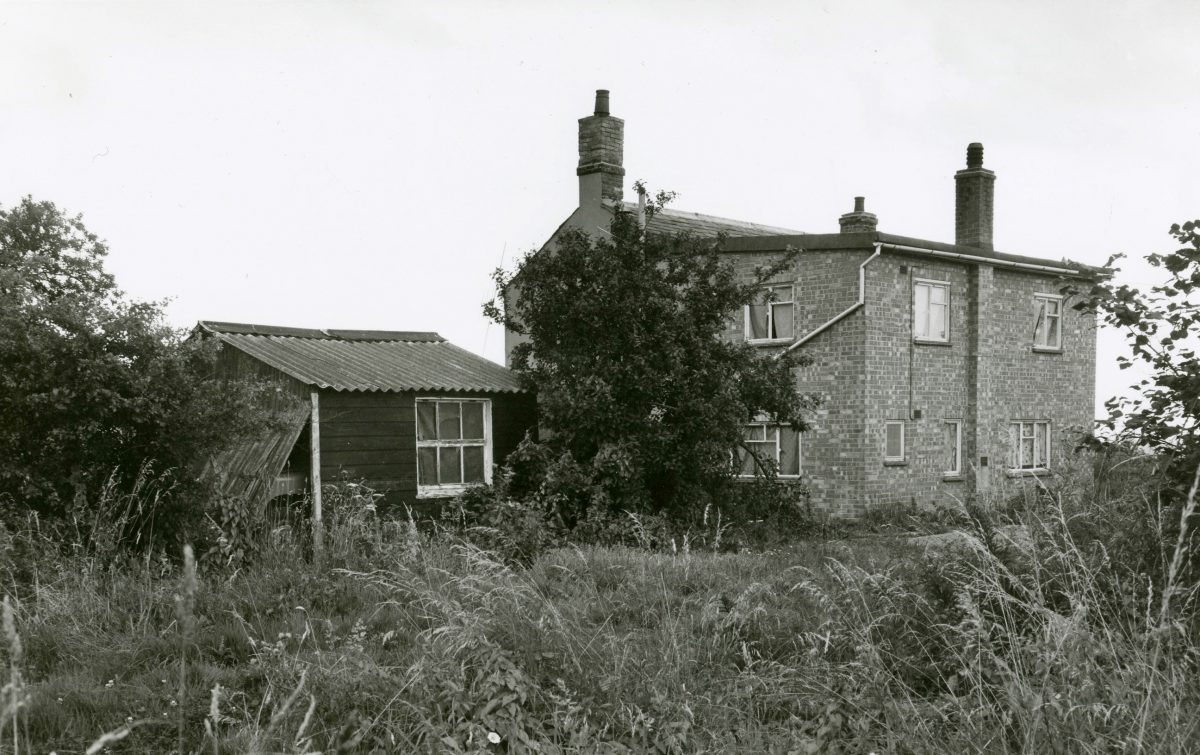 Black and white photograph of the farm of robbers used.