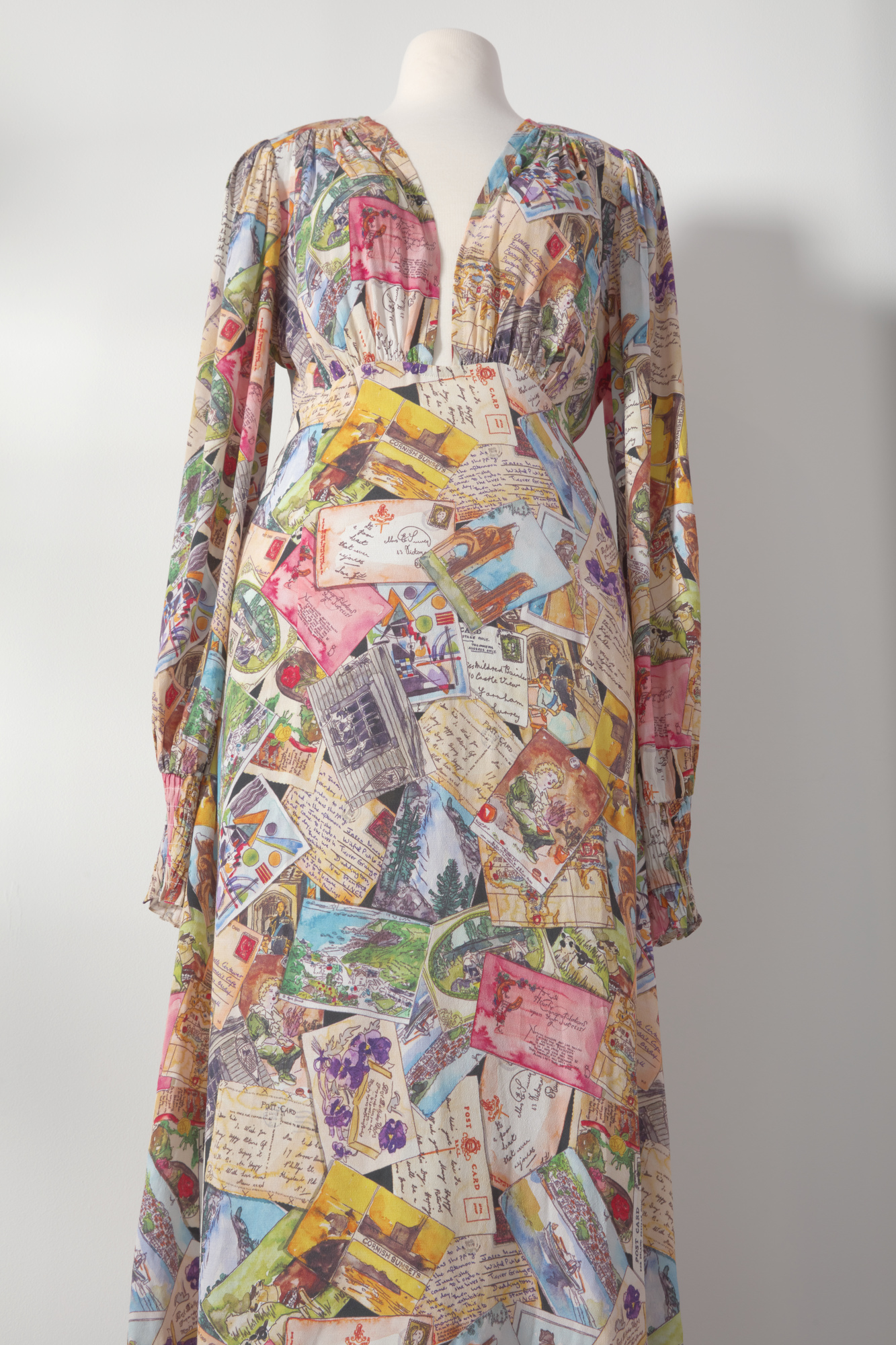 Dress with postcard print pattern.