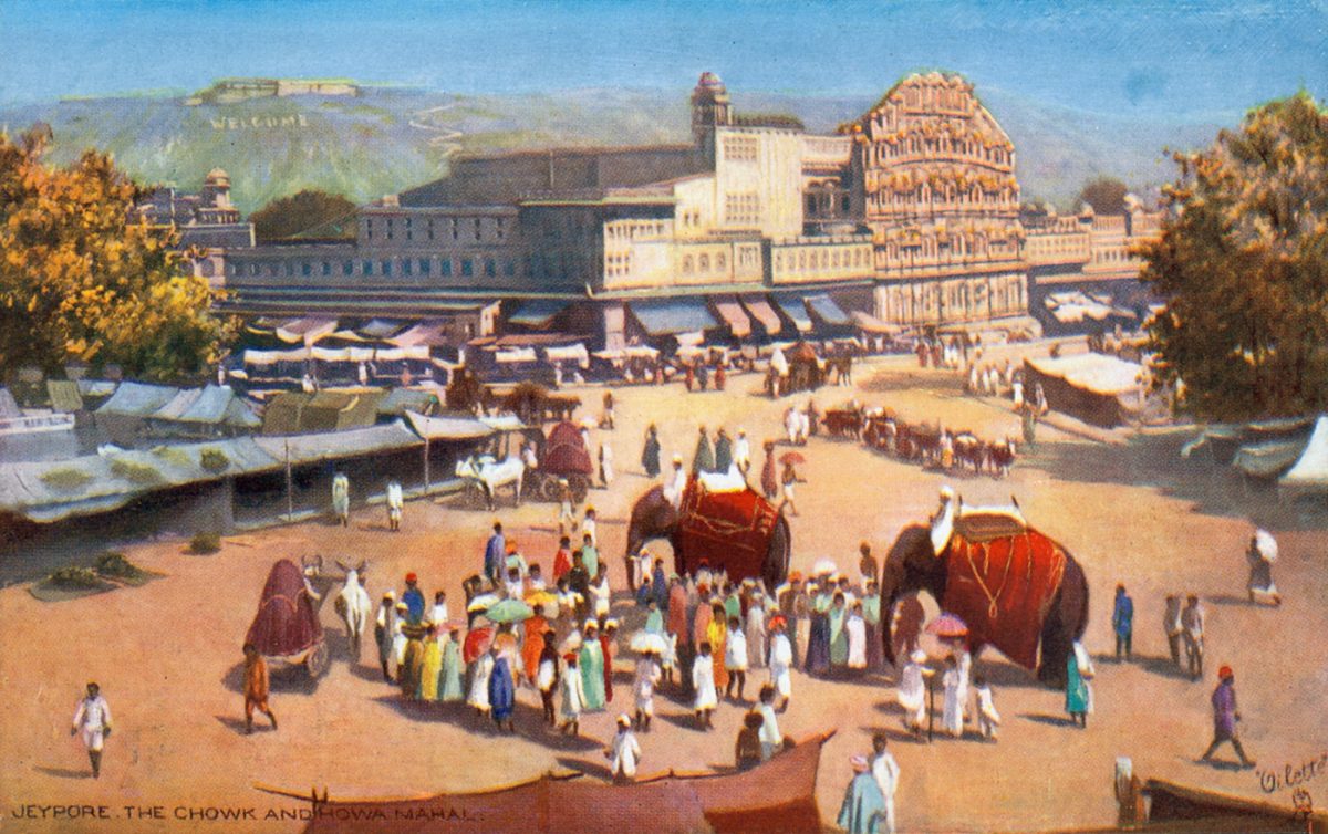 A closeup of an illustrated postcard showing a crowd of people in the centre of an open square, with cows carrying carts and two elephants standing amidst the crowd.