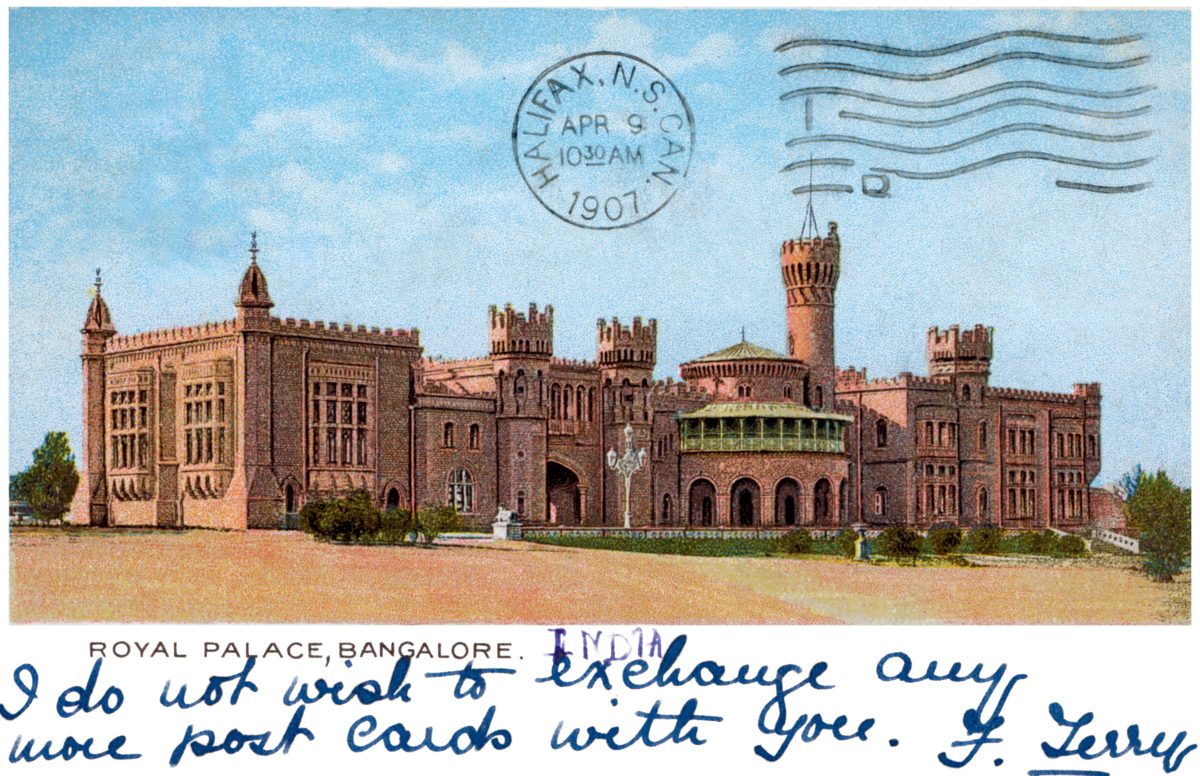 A postcard showing an illustration of a royal palace, with the text 'Royal Palace, Bangalore' printed below this. Handwritten on the postcard are the words: "I do not wish to exchange any more post cards with you."