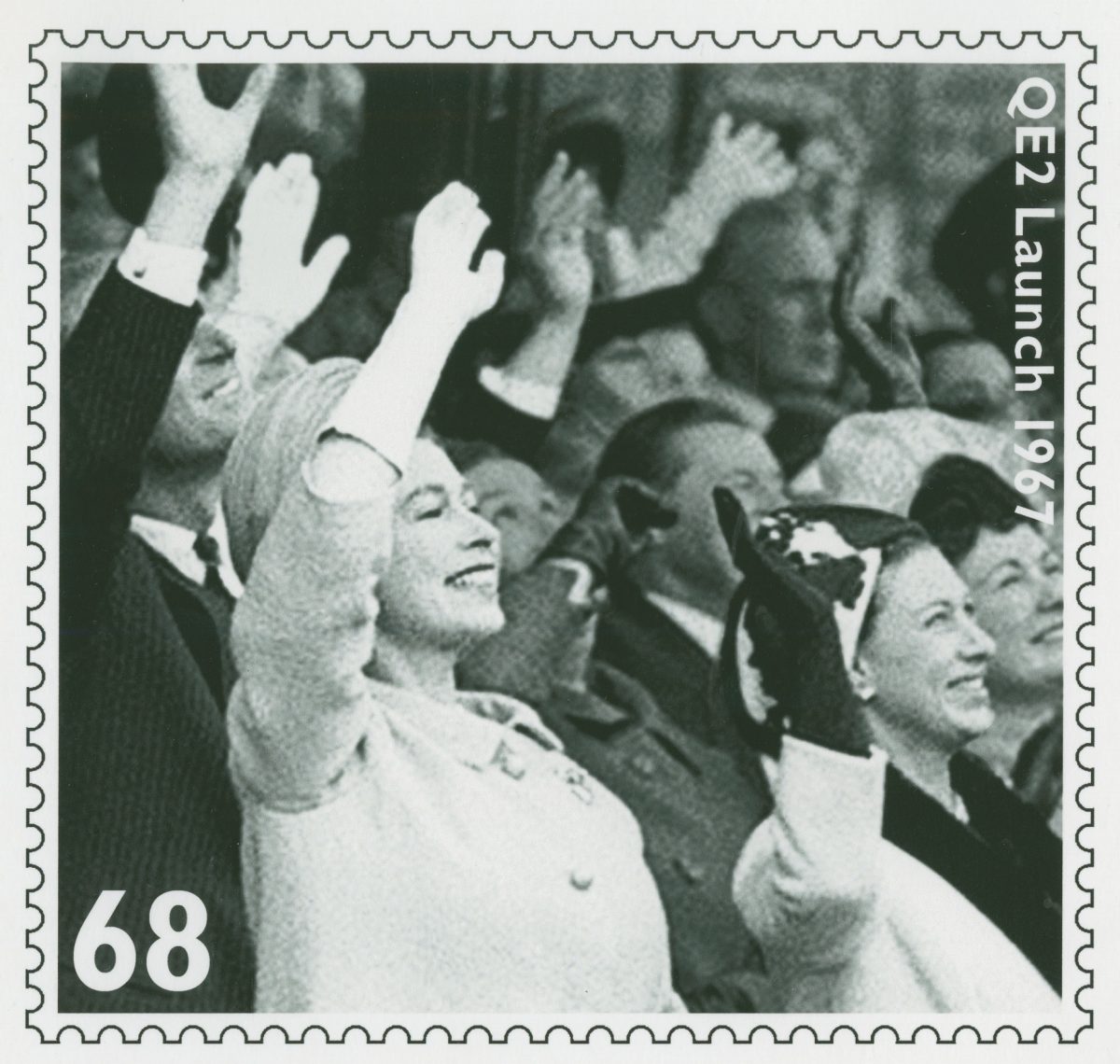 Black and white image of Queen Elizabeth II waving surrounded by others doing the same. 