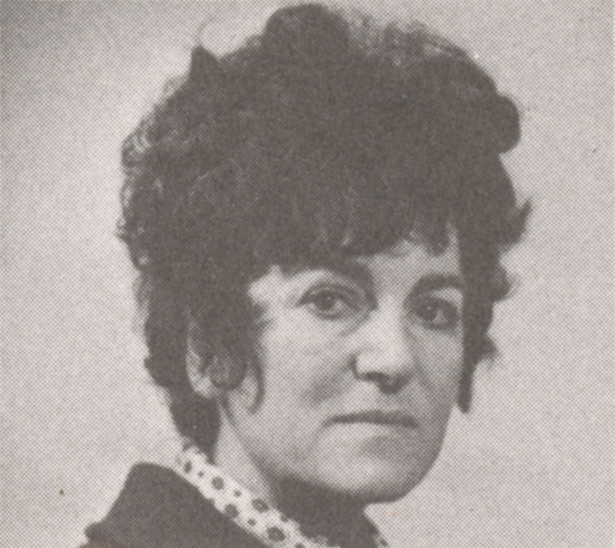 Black and white photograph of a woman's head and shoulders. 