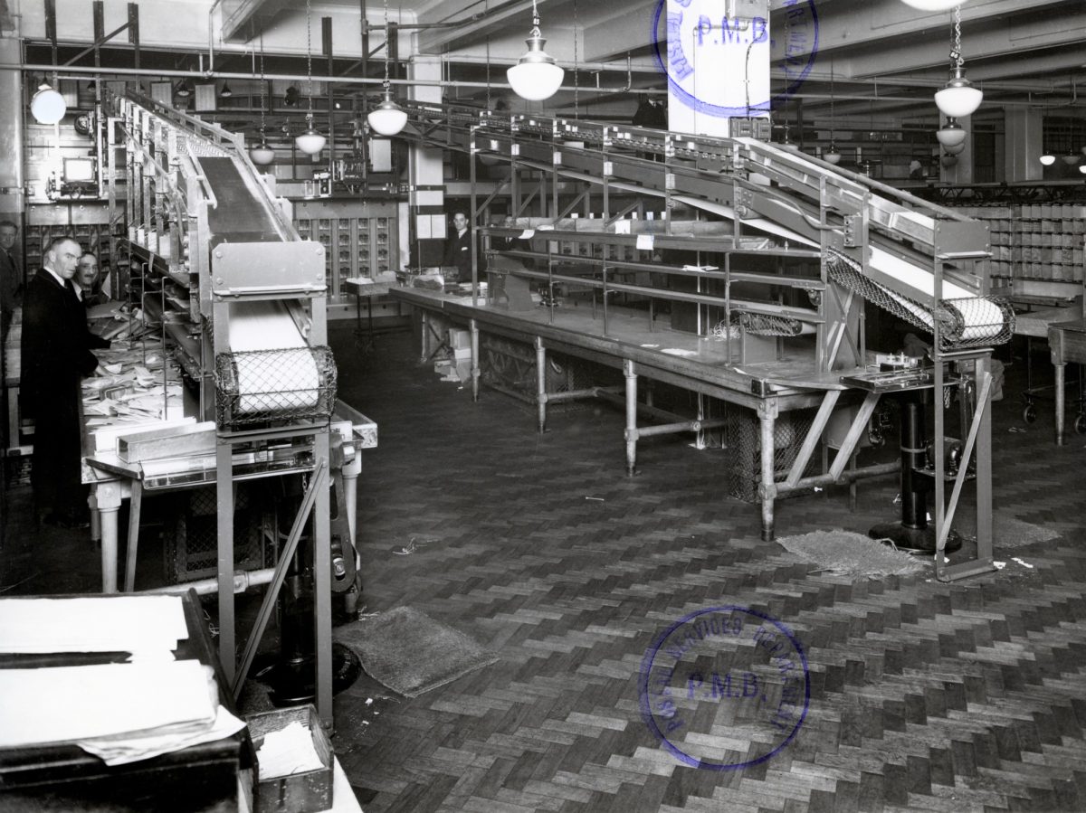 A large room with machinery in the middle.