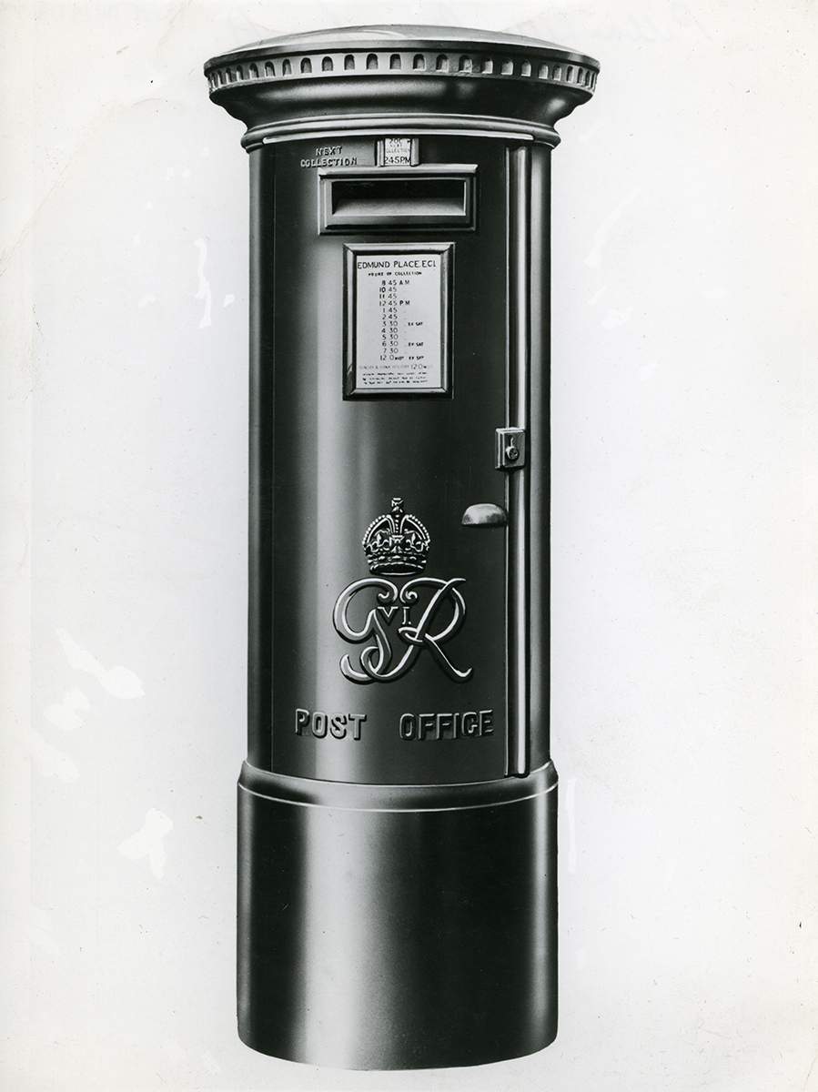 Black and white. Illustration of a pillar box with a King George VI cypher.