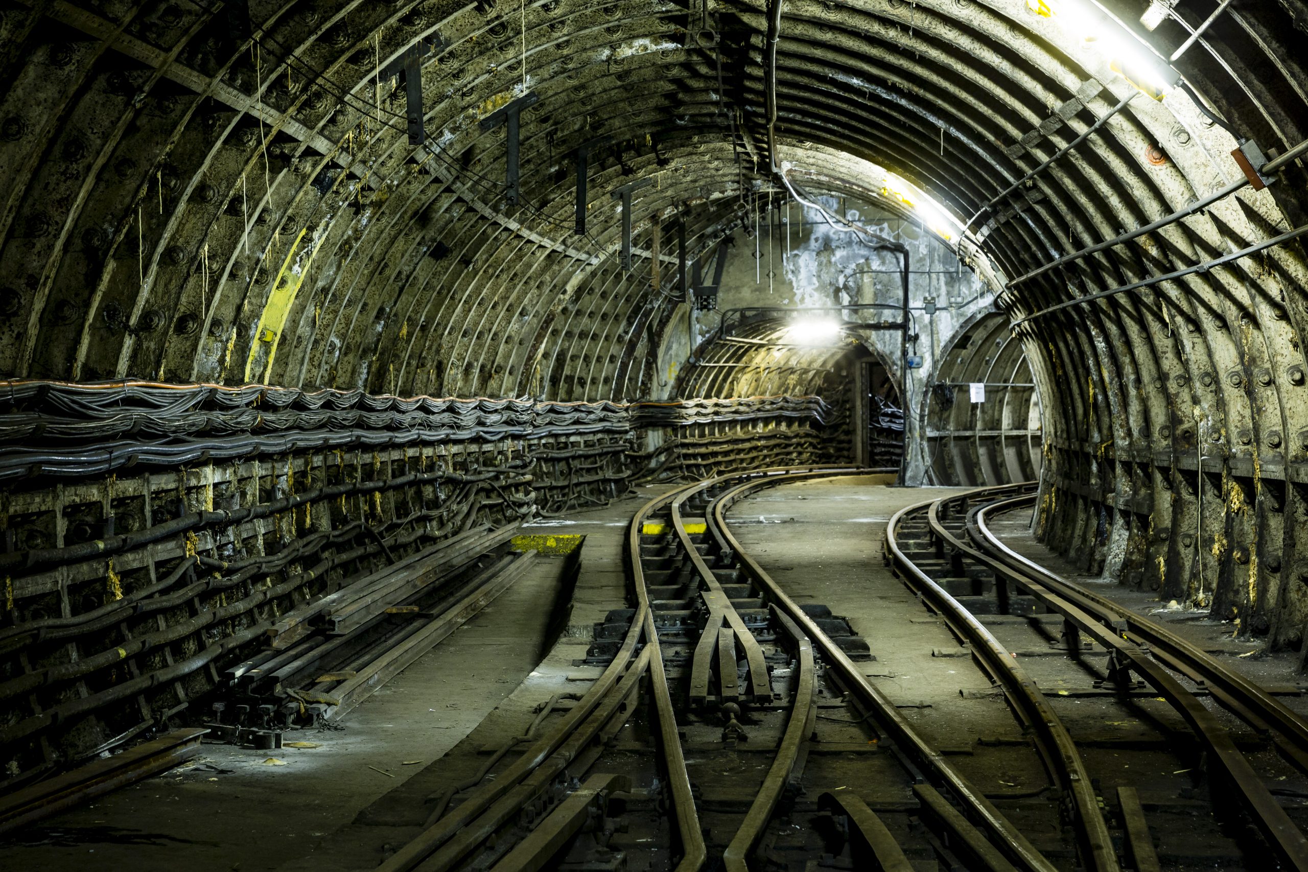 The Mail Rail tracks separating down two different tunnels.