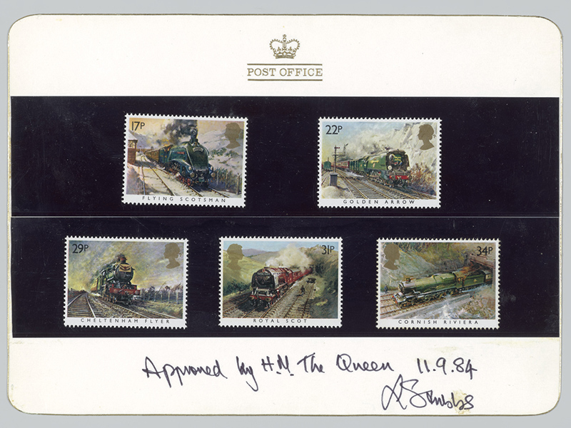 A closeup of a sheet of five stamps, each with illustrations of famous trains.