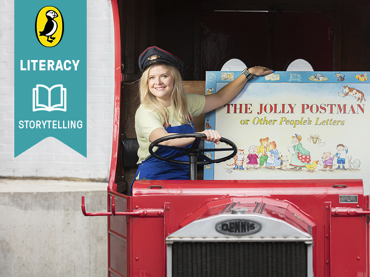 Rosie sits smiling, on what looks to be a red tractor. She is supporting a huge book titled 'The Jolly Postman'. Rosie has blonde hair and is wearing blue overalls and a train driver cap.