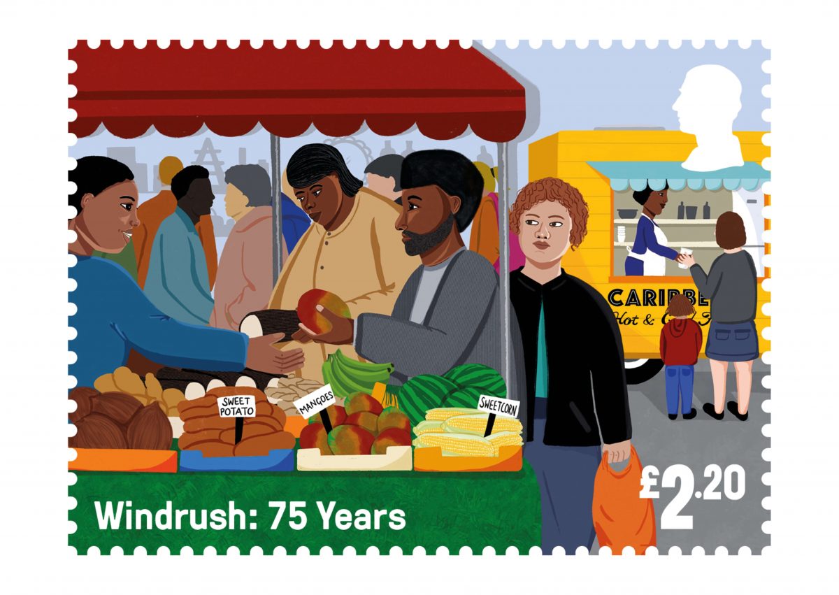 The stamp is bright and bold. In it we can see a Black man buying fruit and vegetables from a market stall. On the stall we can see sweet potatoes, Mangos and Sweetcorn, to name a few items. 