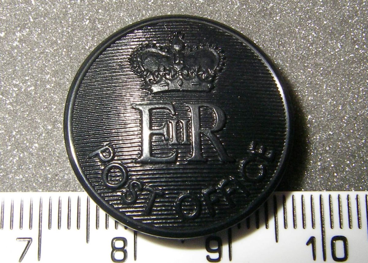 A black bottom with the text Post Office and E-II-R (Elizabeth II Regina). On top, the St Edward's Crown. 