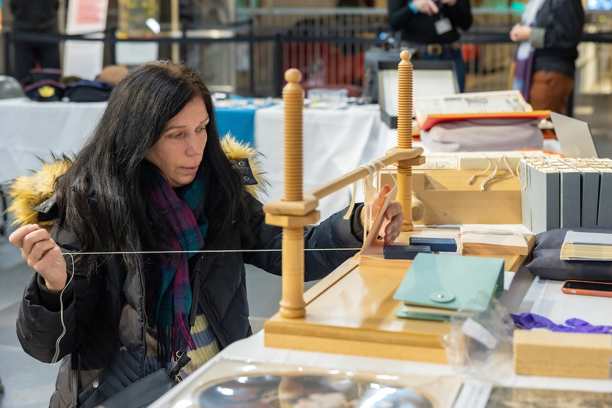 A visitor makes a notebook using a binding matching