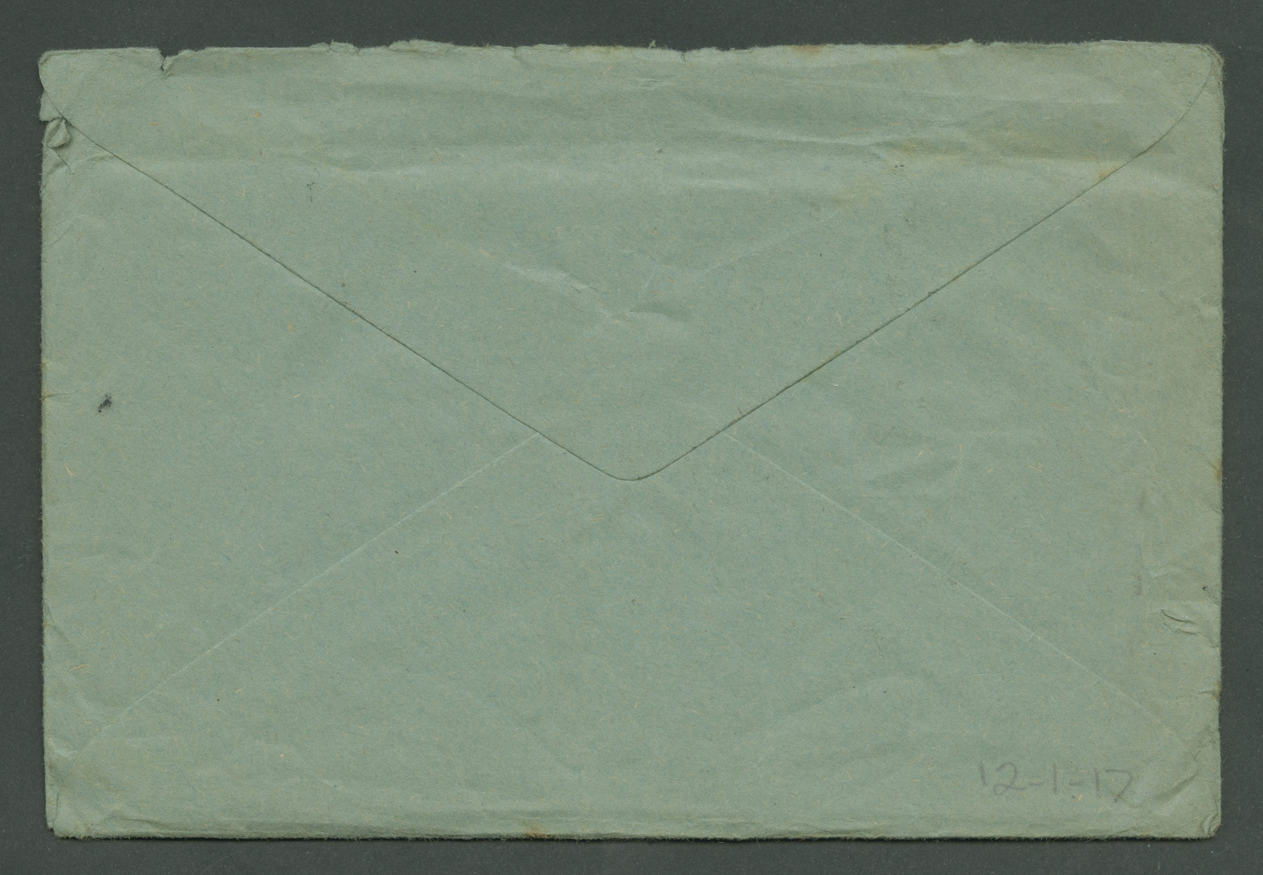 This is the back of the green envelope. There is no text.