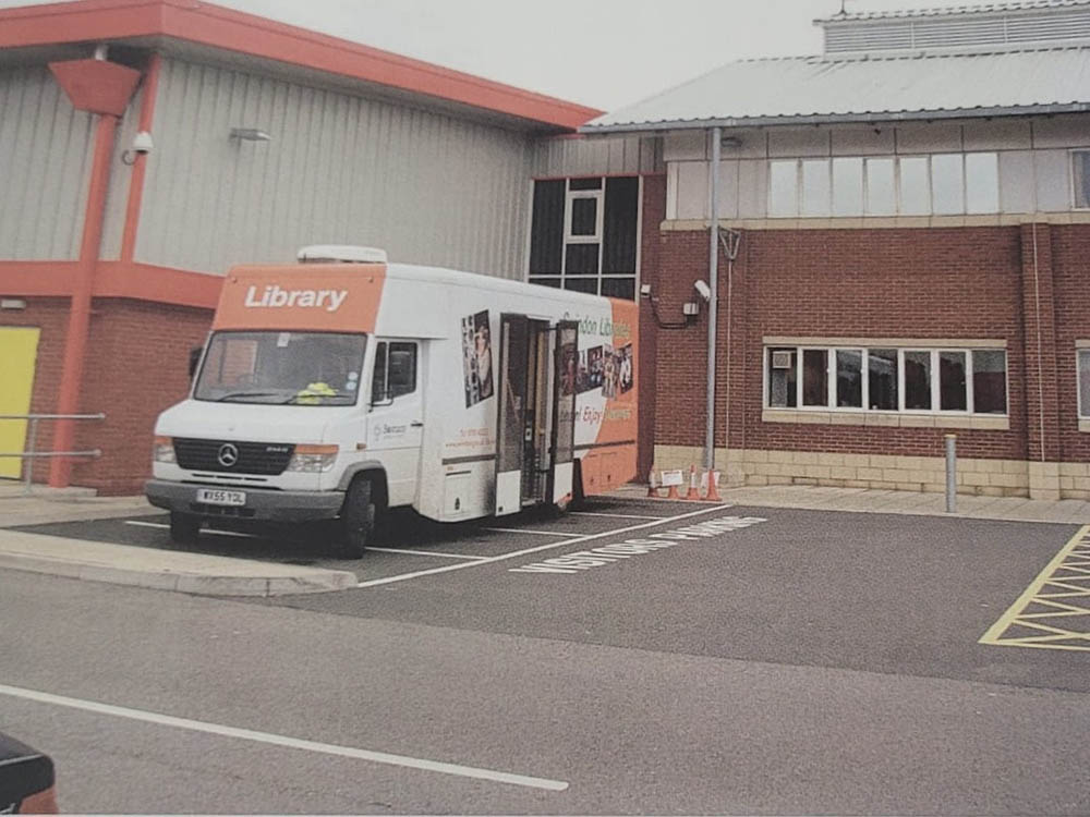 A library van parked outside the mail centre.