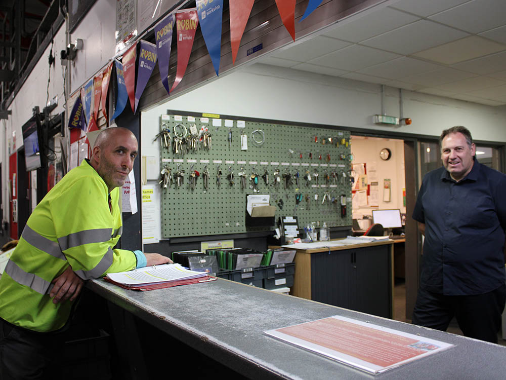 An office worker at a work desk in Swindon.